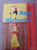575 Marie im Hänneschen Iris SchlüterMit farbigen Bildern von Heribert Stragholz0
