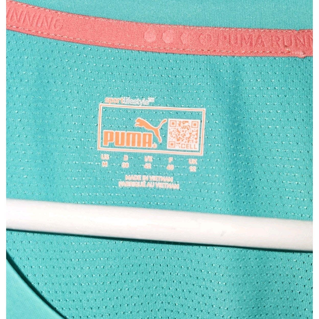 EK11298 Damen Sportshirt von Puma, Türkis, Gr. M1
