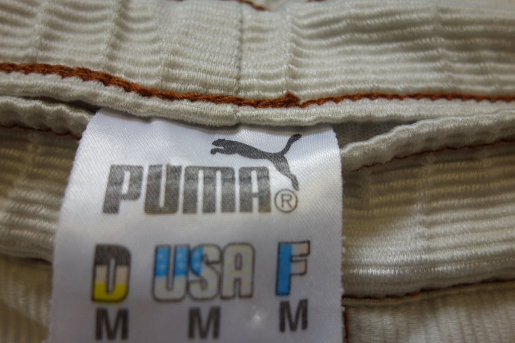EK0952 Herren Shorts von Puma, beige, Gr M4