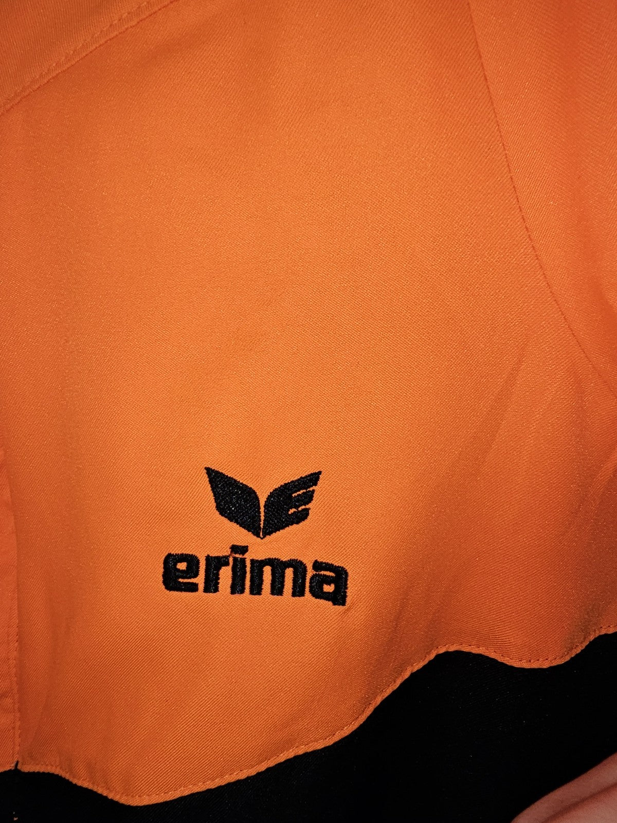 EK7682 Herren 2in1 Trainingsjacke von Erima, Schwarz/Orange, Gr.442