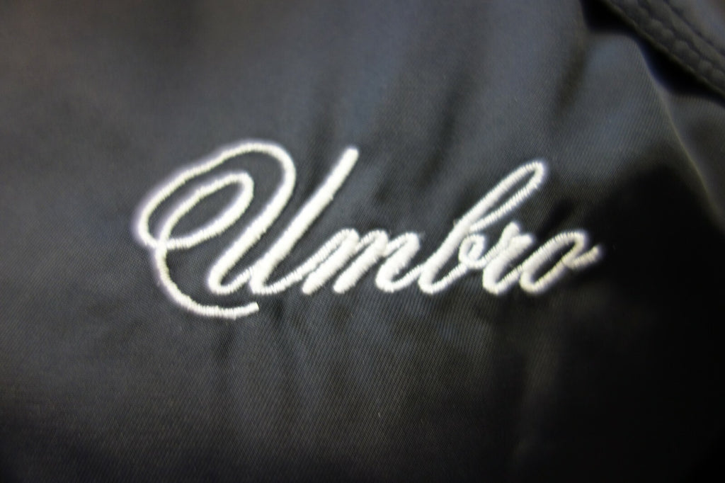 EK0268 Damen Jacke von Umbro, schwarz, 322