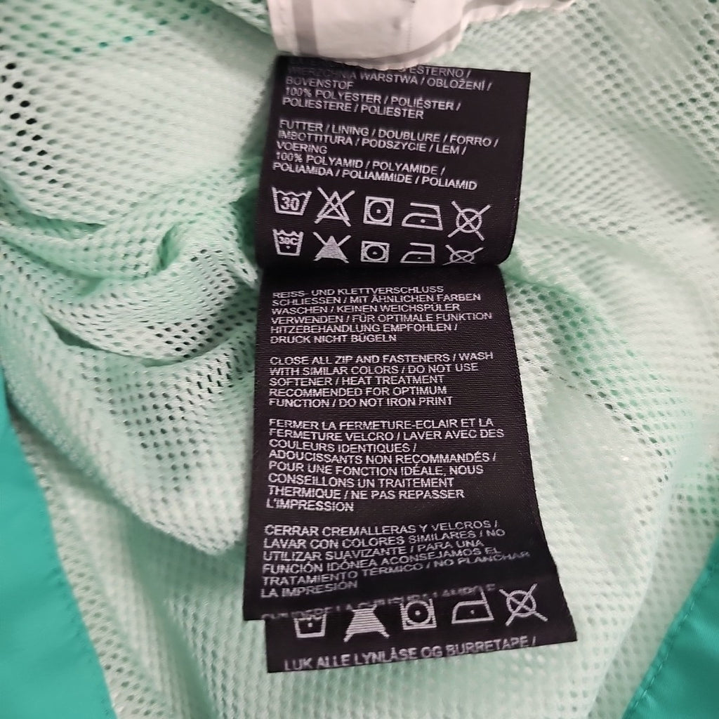 EK7731 Mädchen Windjacke von Jack Wolfskin, grün, Gr.1528