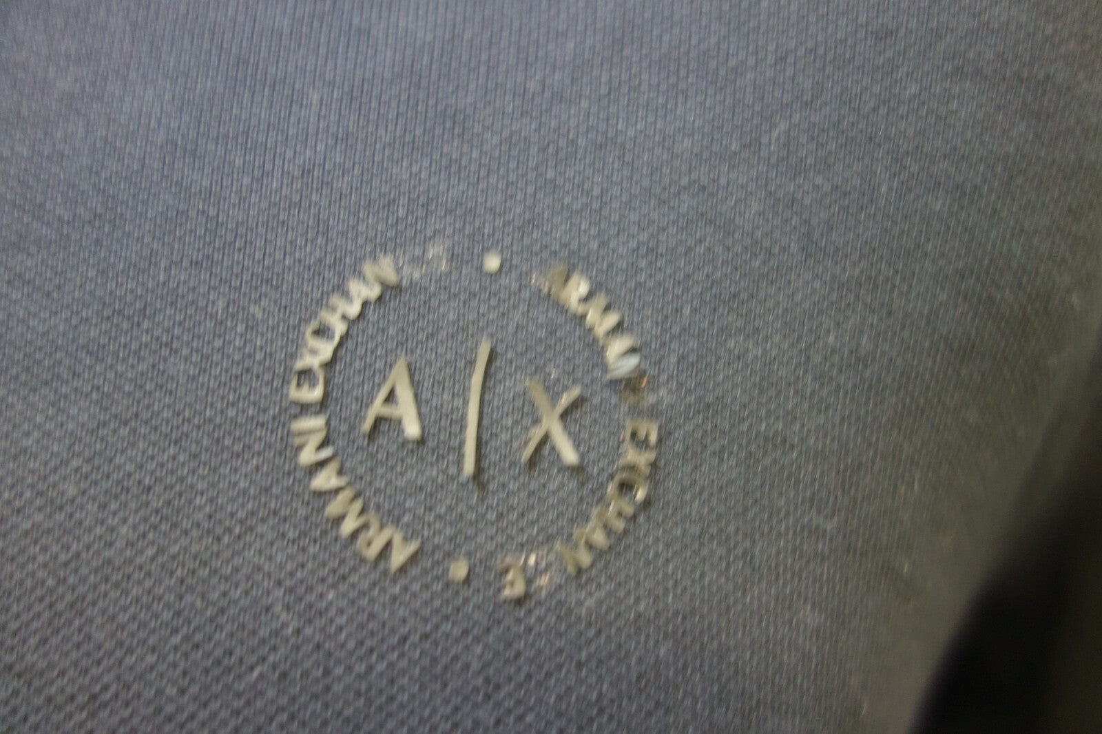 EK0708 Herren Poloshirt von Armani Exchange, schwarz, S2