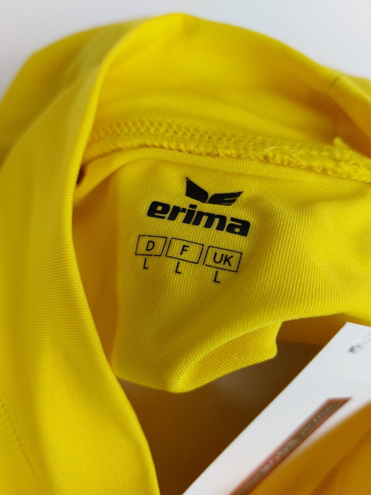 EK0131 Herren Sportshirt von Erima, gelb, eng, Gr. L4